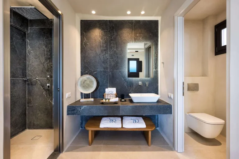 Modern bathroom with walk-in shower and floating vanity